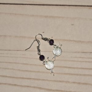 Earrings: hook: Fiber Arts: Knitting needles with a ball of yarn with Purple Crystals