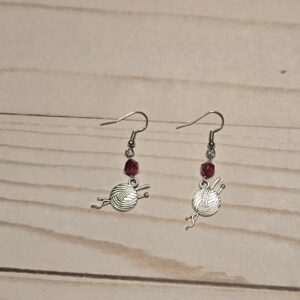 Earrings: hook: Fiber Arts: Knitting needles with a ball of yarn with Red Crystals