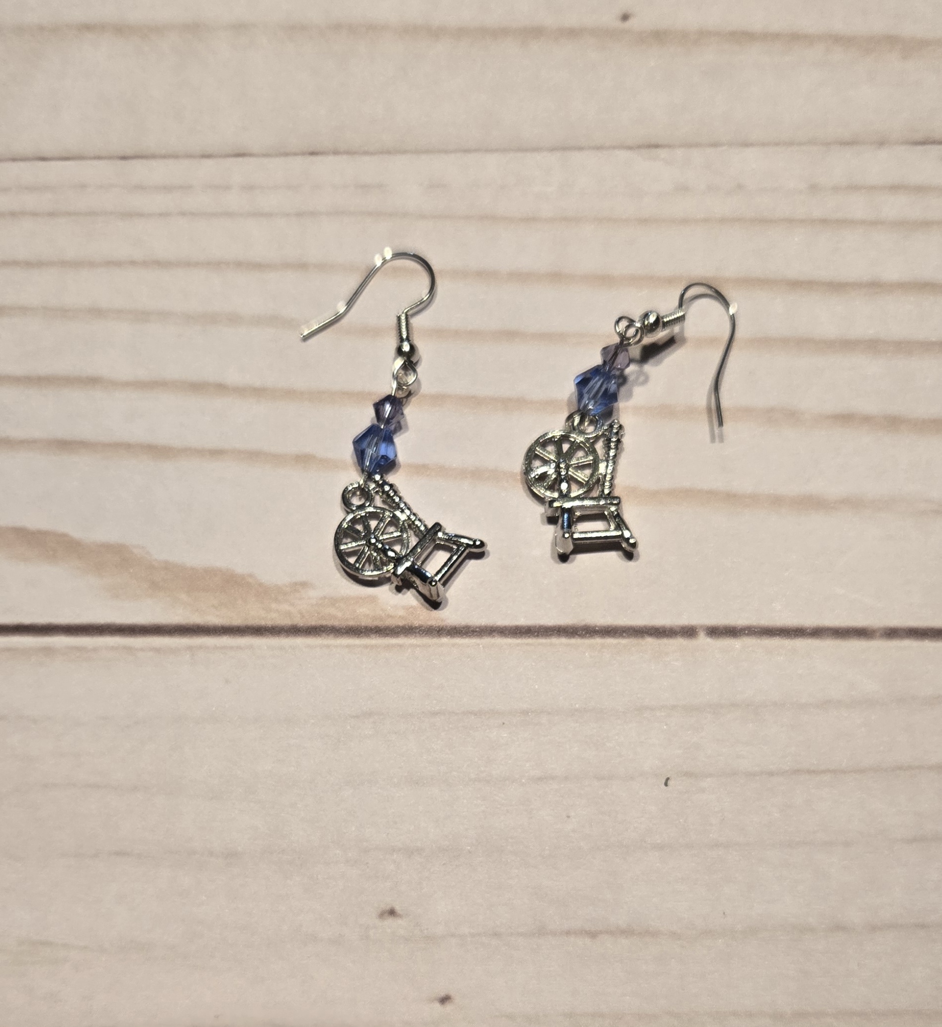Earrings: Hook: Fiber Arts: Spinning Wheel with Grey & Blue Crystals