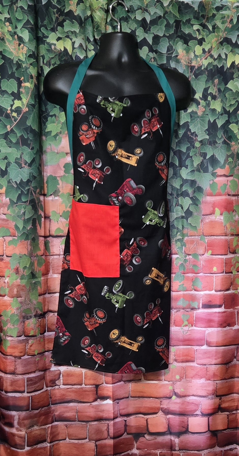Kitchen Apron: Tossed Tractors with red pocket and Green Straps