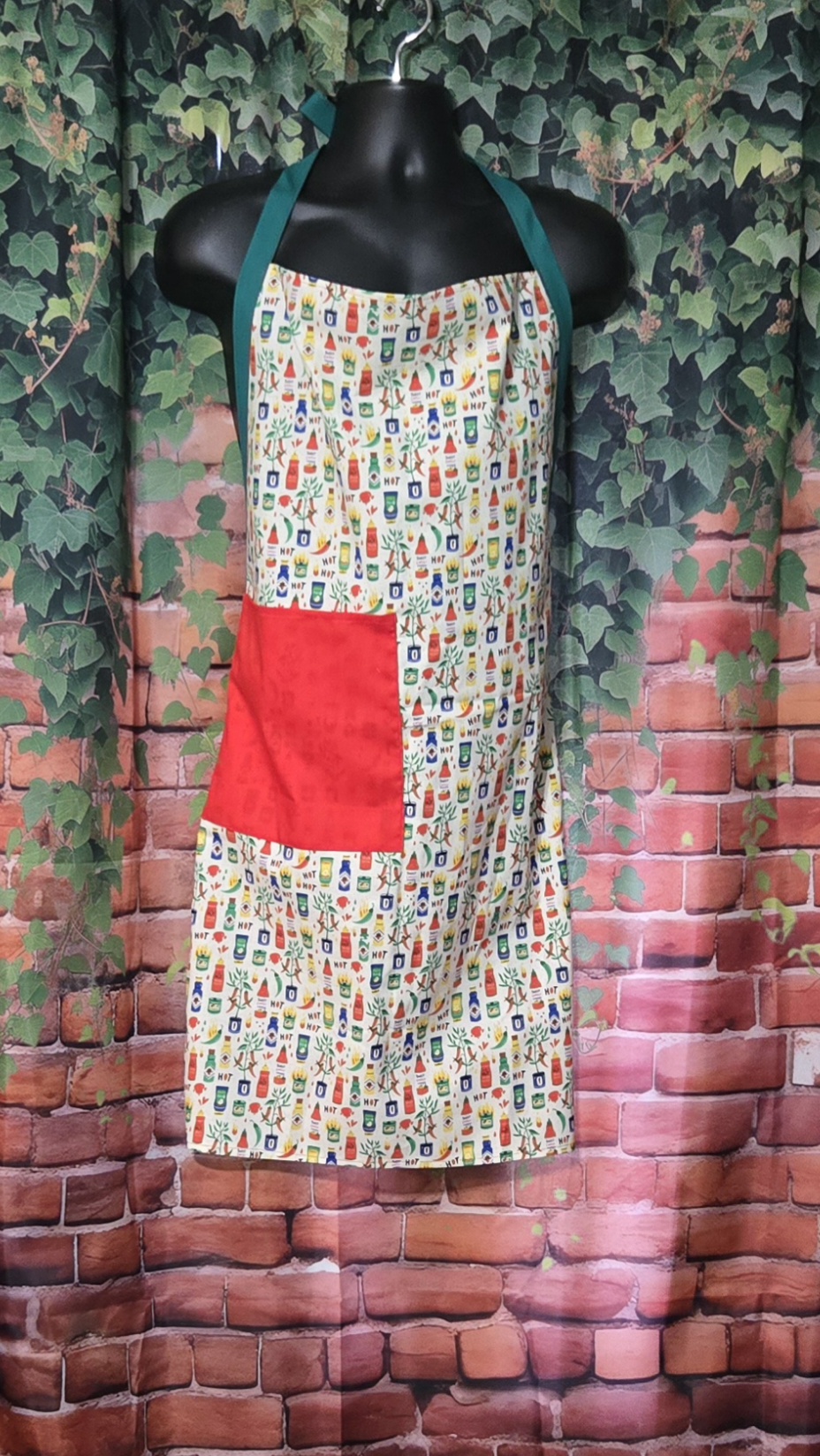 Kitchen Apron: Hot Sauce and Chili with red pocket and Green Straps