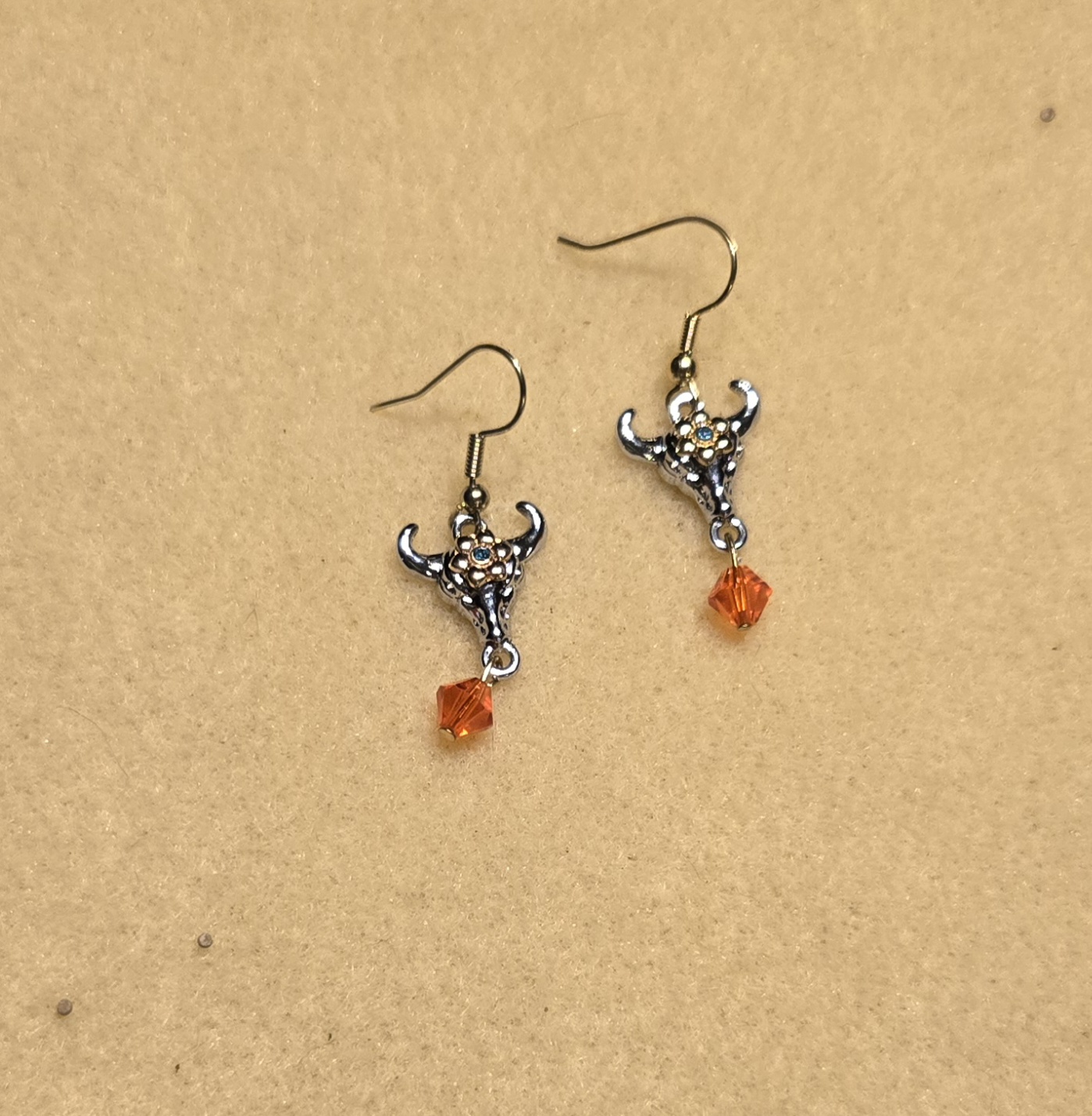Earrings: Hooks: Western Skull with orange Crystals